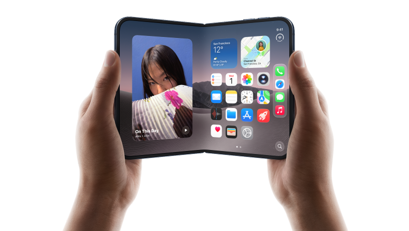 Hands holding an open iPhone Duo
